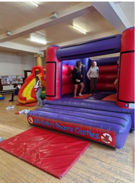 bouncy church - a bouncy castle indoors with teenagers
